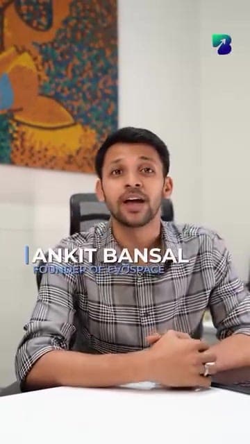 Ankit Bansal, founder of Evospace, speaking to camera at his desk